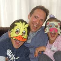 Wild on the web: Adam Beck at his Hiroshima home with his two children, on whom the two simian stars of the Bilingual Monkeys website are based. Educator with a mission sends out support from Hiroshima