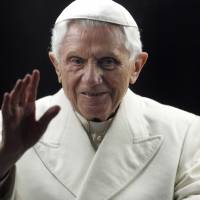 Papal power: Pope Benedict XVI blesses the faithful as he arrives in St. Peter’s Square to bless the nativity scene at the Vatican on Dec. 31, 2011. A document obtained by The Associated Press shows Benedict defrocked nearly 400 priests over just two years for molesting children. Benedict XVI defrocked nearly 400 priests over abuse