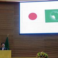 Outreach: Prime Minister Shinzo Abe speaks at the African Union headquarters in Addis Ababa on Tuesday. Japan's Shinzo Abe woos Africa with funds for peace and security