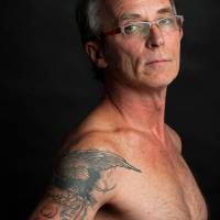 Baltimore resident Dan Whitson, 55, is part of a growing trend that has seen more Americans over the age of 50 getting tattoos. Tattoos make inroads with 50 and older crowd