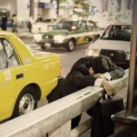 A picture is all you are to me is one of a series of works related to overwork and alcohol abuse in Japan snapped by Storey. British photographer documents lives outside the lines