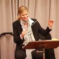 Under the baton: Keri-Lynn Wilson conducts singers during a rehearsal for the New National Theatre, Tokyo’s production of “Madama Butterfly.” First female conductor at NNTT performs 'Madama Butterfly'