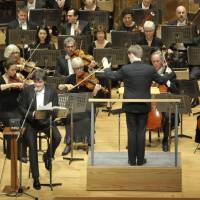 Good conduct: The New York Philharmonic performs Benjamin Britten's The Young Person's Guide to the Orchestra at Tokyo's Suntory Hall on Feb. 11, with music director Alan Gilbert serving as narrator and assistant conductor Joshua Weilerstein at the podium. Fukushima kids compose for Philharmonic