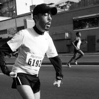 Physical challenge: Venezuelan runner and inspirational speaker Maickel Melamed, who was born with low muscle tone due to a condition called hypotonia, races in his hometown of Caracas. The lesson of the long-distance runner: 'There are no impossibles'