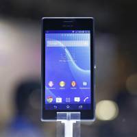 A Sony Xperia Z2 smartphone sits on display at the Sony Corp. pavilion on the opening day of the Mobile World Congress in Barcelona, Spain, on Monday. Sony ups smartphone lineup with Xperia Z2