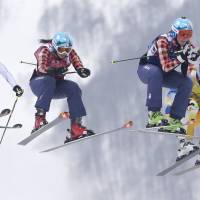 Aerial intensity: (From left) France’s Ophelie David, from left, Canada’s Kelsey Serwa, Canada’s Marielle Thompson and Sweden’s Anna Holmlund race during the women’s ski-cross final in Krasnaya Polyana, Russia, on Friday. Canada takes top two spots in women's ski-cross final