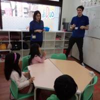 Children attend an English-language lesson last Wednesday at the Chitose Karasuyama branch of the Kids Duo nationwide after-school care chain in Setagaya Ward, Tokyo. After-school clubs falling short as more moms work