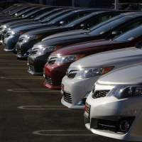 Toyota Camrys and Avalons fill the lot at the DCH Auto Group Dealership in Torrance, California, last July. Toyota tweaks Camry as Sonata makes gains