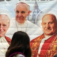 Once, twice, three times a pope: An illustration depicts Pope John Paul II (left) and Pope John XXIII (right), who are due to be canonized as saints Sunday by Pope Francis (center). Critics say the ceremony is being rushed through. Sunday's double-sainthood is not without controversy