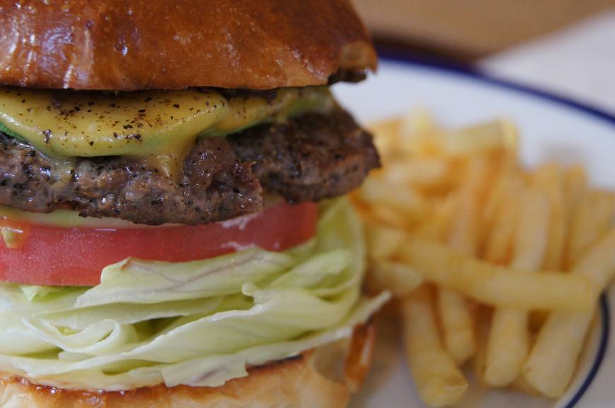 The Corner Authentic eats: The avocado cheeseburger at The Corner. | ADAM MILLER