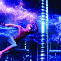 Sticky situation: Spider-Man (Andrew Garfield) battles Electro (Jamie Foxx) in “The Amazing Spider-Man 2.” © 2013 CTMG. The amazing thing about a modern Spider-Man