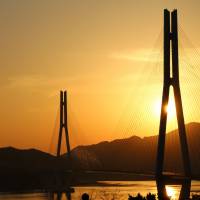 In Setoda, the sun sets behind the stately lines of Tatara Bridge, built in 1999. Walking on water: the seven bridges over the Seto Inland Sea