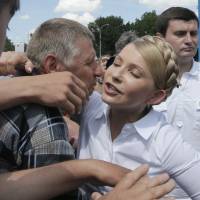 Presidential candidate Yulia Tymoshenko is welcomed by supporters at an election campaign rally held on Thursday in Priluki, northeast Ukraine. Ukraine's candy king in bid for presidency