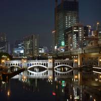 The Osaka skyline glows over the city’s Nakanoshima district on May 2. Industrial heartland faces possible energy crunch