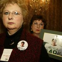 The 2004 hearing: Terri Williams (left) and Rhonda Thrower, wait in line to speak during a Food and Drug Administration public hearing on antidepressant drugs on Feb. 2, 2004, in Bethesda, Maryland. Williams’ son Jacob committed suicide at age 14 while on antidepressant drugs. 'Black box' antidepressant warnings reviewed after rise in youth suicide attempts
