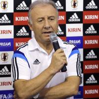 Power struggle: National team manager Alberto Zaccheroni addresses the media in Itu, Brazil, on Saturday. Power play 'not in Japan's DNA,' admits Zaccheroni