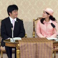 Cause to celebrate: Princess Noriko, second daughter of the late Prince Takamado and Princess Hisako, attends a news conference with fiance Kunimaro Senge at the Imperial Household Agency in Tokyo last week. Princess Noriko is engaged to Senge, eldest son of the chief priest of grand shrine Izumo-Taisha. Media minds manners in royal reportage