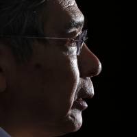 Bank of Japan Gov. Haruhiko Kuroda holds a news conference at the central bank’s headquarters in Tokyo on Tuesday as the BOJ maintained its stimulus program and stuck to its forecast that inflation will approach its 2 percent target next year. Kuroda softens yen stance as export pain eases