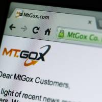 The website of Mt. Gox, showing the notice for the close of all transactions on the company's operations and the market, is displayed on a laptop computer monitor in this arranged photograph in Tokyo Feb. 26. Cyberattacks on Mt. Gox began soon after failed bitcoin firm's launch: police