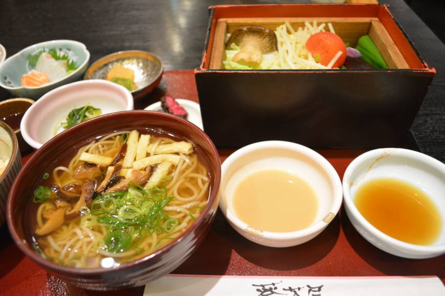 Aoi-jaya Big lunch: One of many generous flower-themed lunch sets at Aoi-jaya, including the specialty seiro bushi bamboo-steamer dish at top right. | J.J. O'DONOGHUE