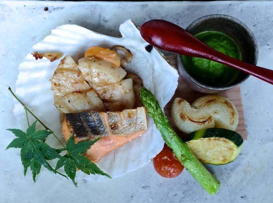Kazahana High dining: A dish of grilled seafood at Kazahana, on the 28th floor of Tokyo's Conrad Hotel. | ROBBIE SWINNERTON