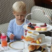 Toddlers tuck in: The Kid's Afternoon Tea set at The Ritz Carlton, Tokyo includes mini burgers, vegetable potage, fried prawns and various sweets. The Ritz-Carlton could be your kid's cup of tea