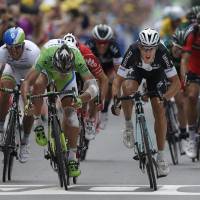 Almost too close to call: Italy’s Matteo Trentin (right) beats Peter Sagan (left) to the finish line on Friday in Nancy, France. Trentin gets stage victory
