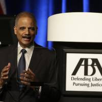 Attorney Gen. Eric Holder speaks to the American Bar Association Annual Meeting in San Francisco on Aug. 12. U.S. attorney general brings personal experience in civil rights to Missouri racial crisis