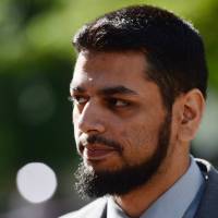 Khurram Syed Sher walks outside court in Ottawa on Tuesday. Sher, who once auditioned for the “Canadian Idol” TV show, has pleaded not guilty to a terrorism charge. 'Canadian Idol' contestant acquitted on terrorism charge