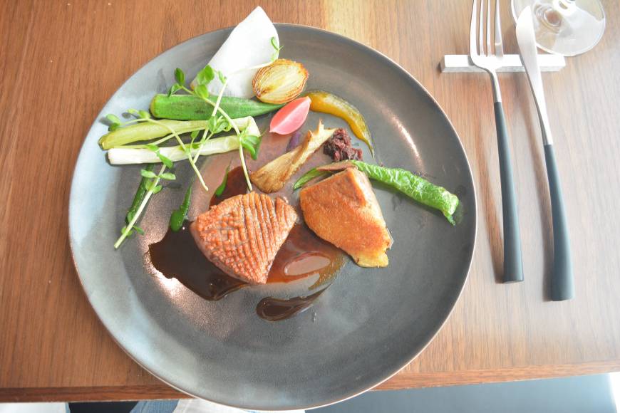 Eloge de l’Ombre Creative cooking: A dish of duck and vegetables drizzled in ume and honey sauce at EO, a new restaurant run by celebrated chef Hiroshi Yamaguchi. | J.J. O'DONOGHUE