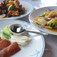 Extravagant Chinese dining: The Beijing-style cuisine at Tohkasaikan is pricey but good, though the Peking duck (front) is somewhat on the stingy side. Tohkasaikan: Chinese food in a location that (almost) justifies the price