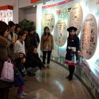 Sweet history: A tour guide at the Glico factory explains the confectionary company’s rise to prominence. Kids can learn a lot from being on the factory floor