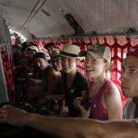 Stranded tourists wait in San Jose Del Cabo for a Mexican Army plane to transport them to Mazatlan international airport, after Hurricane Odile hit Baja California on Wednesday. Odile threatens U.S.-Mexico border with flooding, mudslides