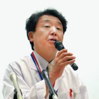 Yasuo Kurimoto, one of the surgeons who conducted the world's first transplant surgery using induced pluripotent stem cells, meets the press on Saturday morning in Kobe. Patient claims brighter eyesight after world's first iPS retina transplant