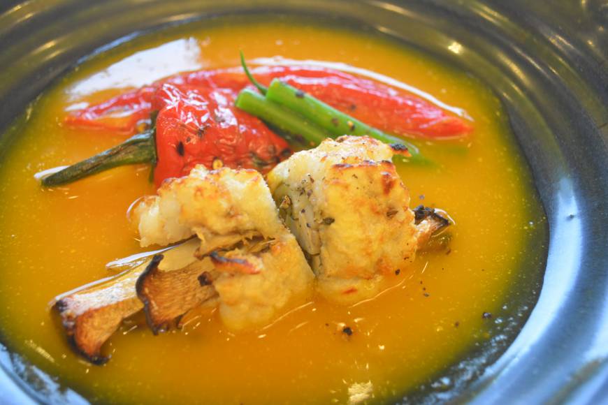 Wakuden Creative kaiseki: Butternut squash soup with conger-eel-wrapped enoki mushrooms and broiled paprika, a highlight at Wakuden. | J.J. O'DONOGHUE