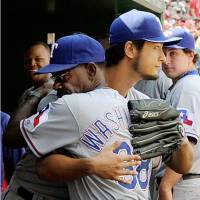 So long and goodbye: Ron Washington (front) is the only manager pitcher Yu Darvish has known in his career as an MLB player. Washington stuns team, Darvish with resignation