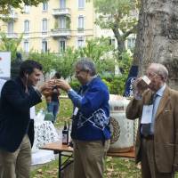 Salute: Guests drink at the Milano Sake Festival (Marco Massarotto center-left, with brown curly hair). Selling the Italians on sake, 'the wine of Japan'