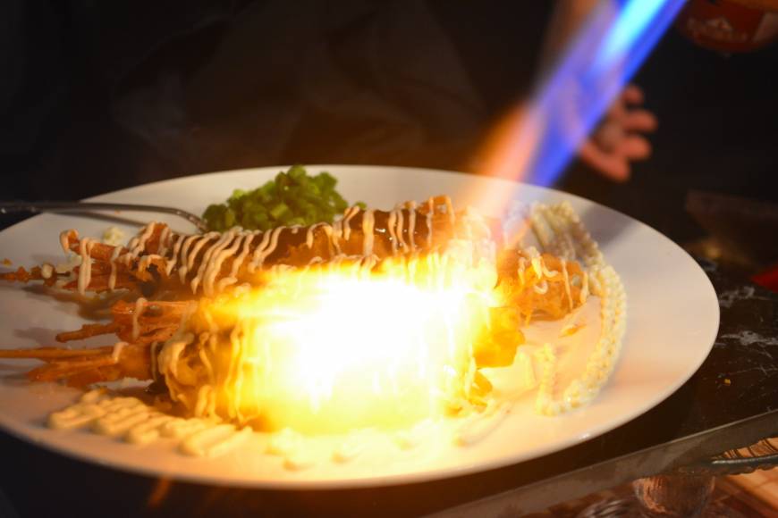 Mantenya Hot meal: One of many prawn dishes at Osaka restaurant Mantenya, this time finished at the table with a blow-torch. | J.J. O'DONOGHUE