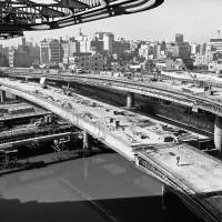 Price of progress: Massive construction projects in Tokyo, like the expressway seen here in this Dec. 16, 1963, photo, helped modernize the city, but exacted a toll on the environment. Negative impact of 1964 Olympics profound