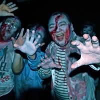 Convincing-looking zombies maul drinkers at the Zombie Bar. Dead reckoning in the haunts of Honancho