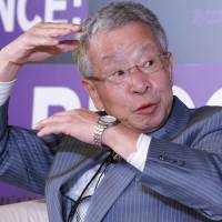 Eisuke Sakakibara, a former Finance Ministry bureaucrat dubbed “Mr. Yen,” speaks at a business conference hosted by Bloomberg in Tokyo in October 2011. 'Mr. Yen' sees drop in exchange rate he forecast coming to an end