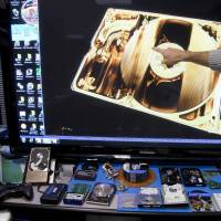 Evidence is displayed at the Defense Computer Forensics Laboratory in Linthicum, Maryland, in September. A $10 billion-a-year effort to protect sensitive government data, from military secrets to Social Security numbers, is struggling to keep pace with an increasing number of cyberattacks. U.S. government struggling to keep pace with cyberattacks
