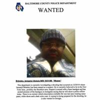 The Baltimore County Police Department issued this wanted poster of Ismaaiyl Brinsley after he shot his ex-girlfriend and posted an online death threat against police. Facebook threats about police 'wings on pigs' tests U.S. speech rights