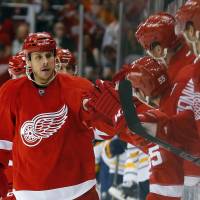 Just winging it: Detroit center Stephen Weiss is congratulated after scoring against Buffalo on Tuesday. The Red Wings won 6-3 to end a six-game losing streak. Red Wings beat Sabres to end skid