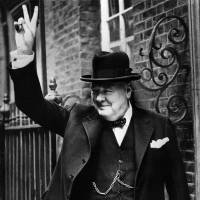 Winston Churchill flashes the V for victory sign outside 10 Downing Street in London in 1943. Britain marks 50th anniversary of Churchill's death