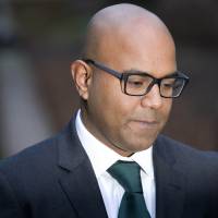 Dr. Dhanuson Dharmasena arrives at Southwark Crown Court in central London on Monday. He faces the first prosecution linked to alleged female genital mutilation in England and Wales. U.K. holds first trial over female genital mutilation