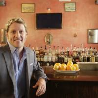 Jayson Seaver has his photo taken in New York’s Harding’s restaurant, of which he is a part owner, last month. Wealth gap dividing relationships