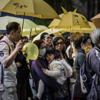 Demonstrators march for democracy in Hong Kong on Sunday. A disappointing turnout at Hong Kong’s first democracy rally since the end of mass street demonstrations shows the city is suffering from “protest fatigue” and new longer-term strategies are needed to drive reform, analysts say. 'Protest fatigue' in Hong Kong as activists struggle over strategy
