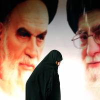 A giant poster in Tehran shows Iran’s supreme leader, Ayatollah Ali Khamenei (right), and the country’s founder, Ayatollah Ruhollah Khomeini, earlier this month in Tehran. According to leaked cables, South Africa played a supporting role in the proxy conflict between the West and Iran, monitoring suspected Iranian spies on its soil. Leaked cables put South Africa spycraft on display