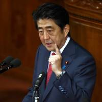 Prime Minister Shinzo Abe delivers a policy speech at the Lower House of the Diet on Feb. 12 in Tokyo. Tokyo and Washington are arranging for Abe to address Congress during a visit to the United States this spring, a Japanese government official said Saturday. Tokyo, Washington arranging for Abe to address U.S. Congress in spring